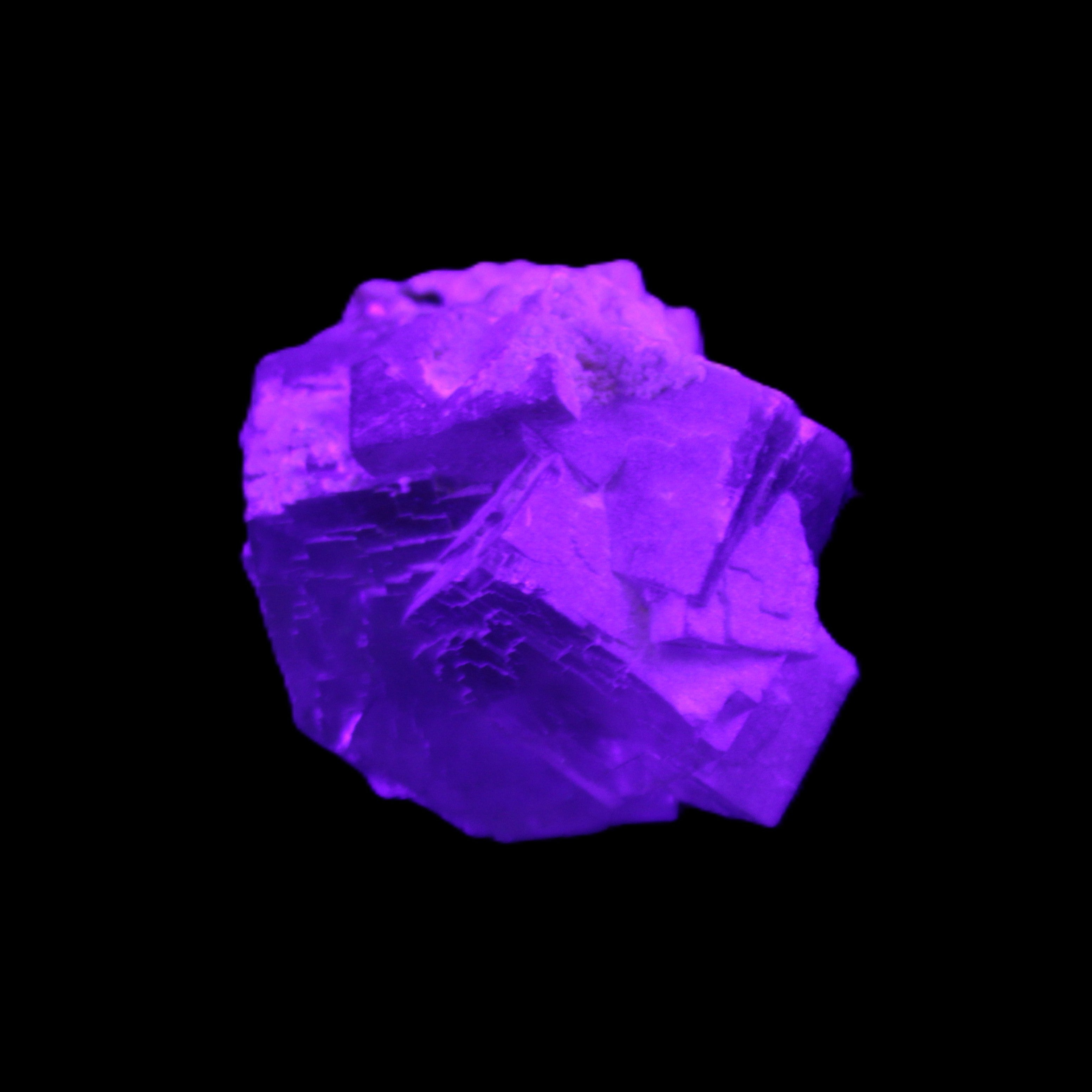 Clear Fluorite cubic cluster 45*40*40mm 102g in UV light - Rocks and Things Store