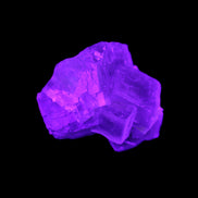 Clear Fluorite cubic cluster 45*40*40mm 102g in UV light - Rocks and Things Store