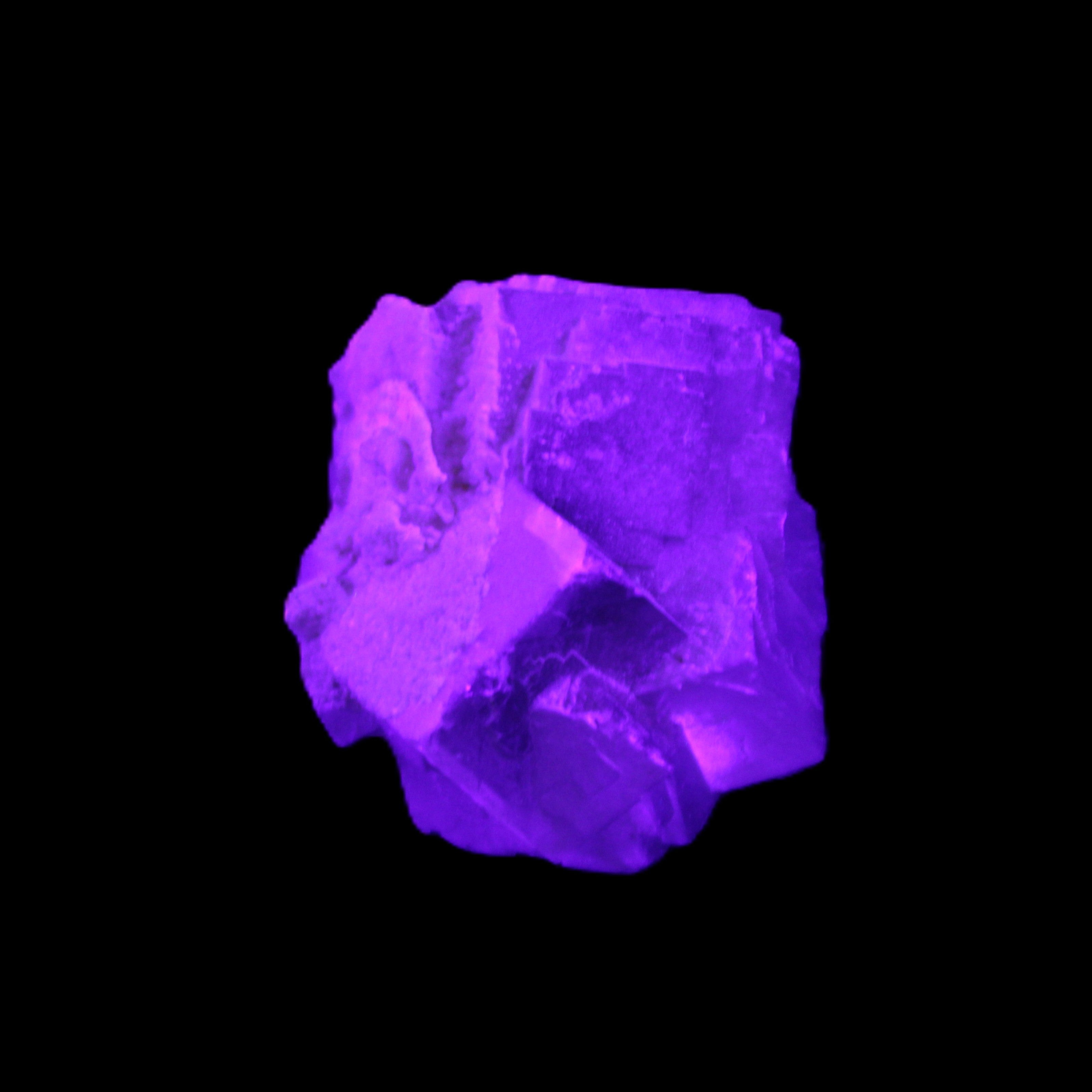 Clear Fluorite cubic cluster 45*40*40mm 102g in UV light - Rocks and Things Store