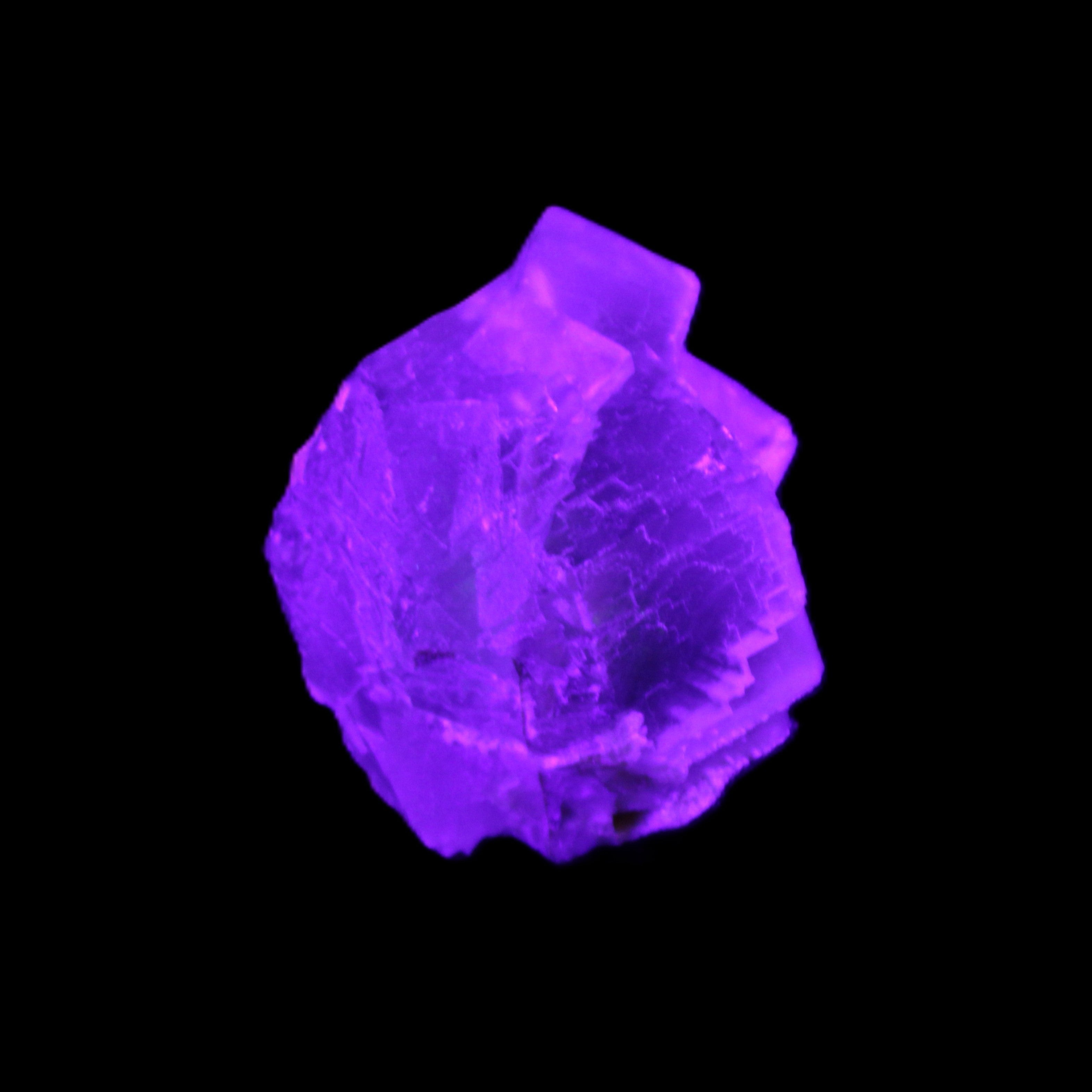Clear Fluorite cubic cluster 45*40*40mm 102g in UV light - Rocks and Things Store