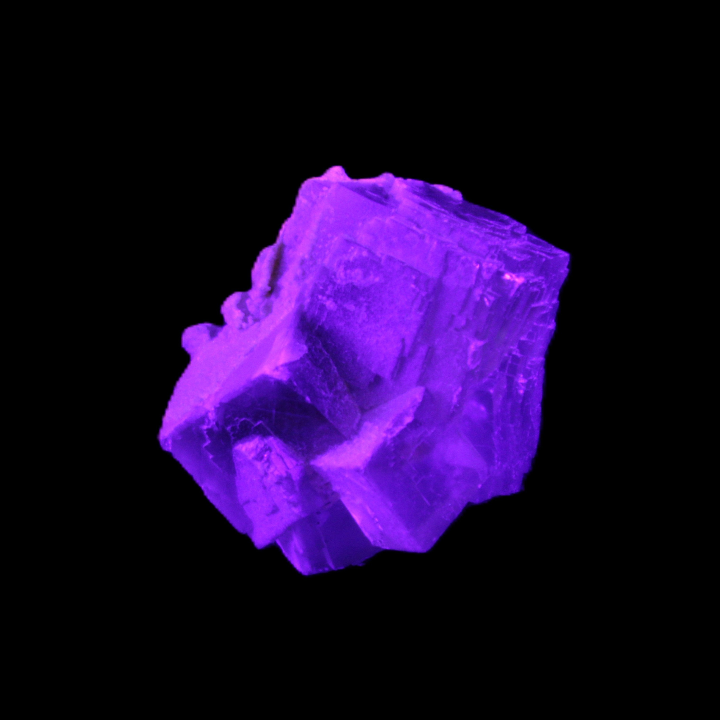 Clear Fluorite cubic cluster 45*40*40mm 102g in UV light - Rocks and Things Store