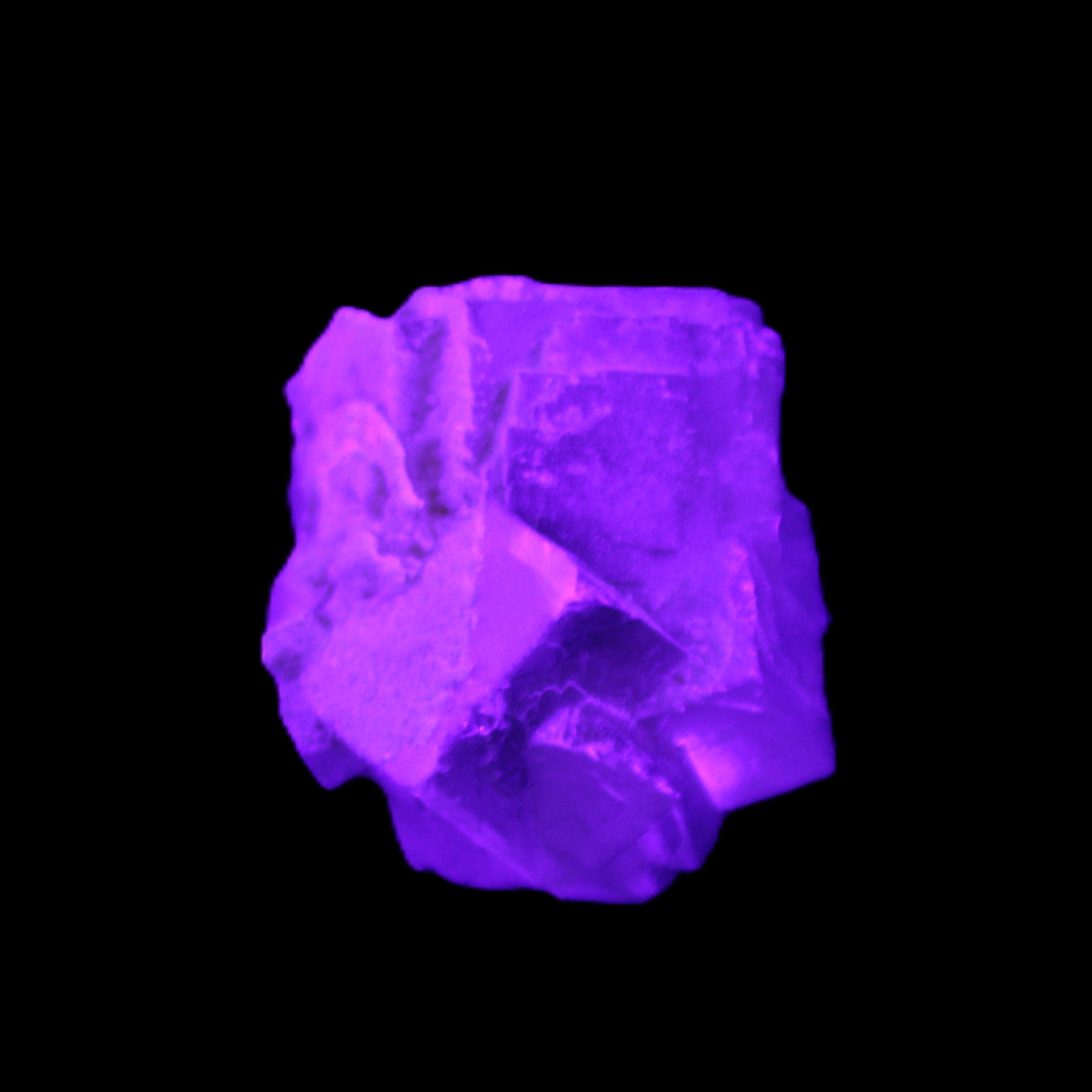 Clear Fluorite cubic cluster 45*40*40mm 102g in UV light - Rocks and Things Store