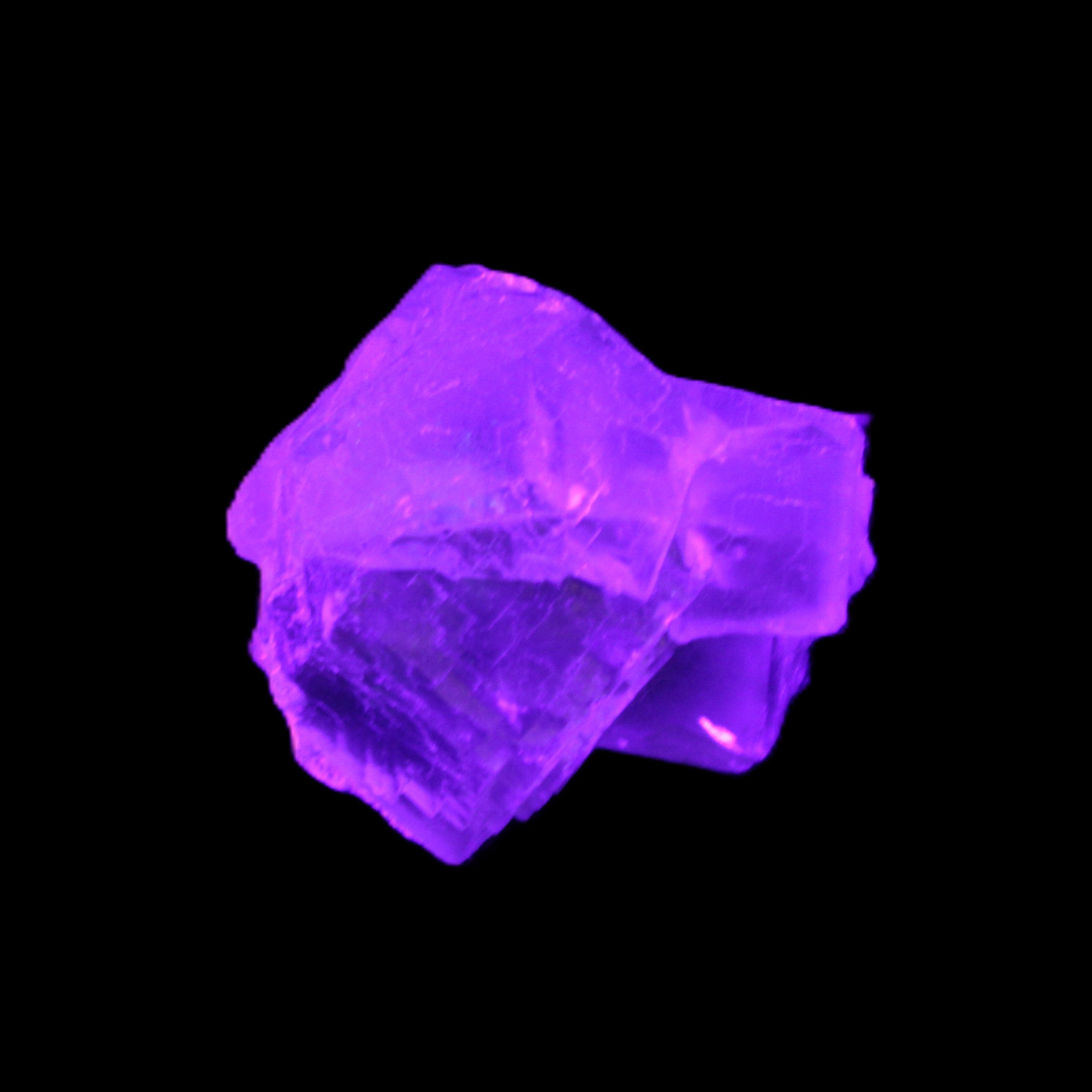 Clear Fluorite cubic cluster 45*40*40mm 102g in UV light - Rocks and Things Store