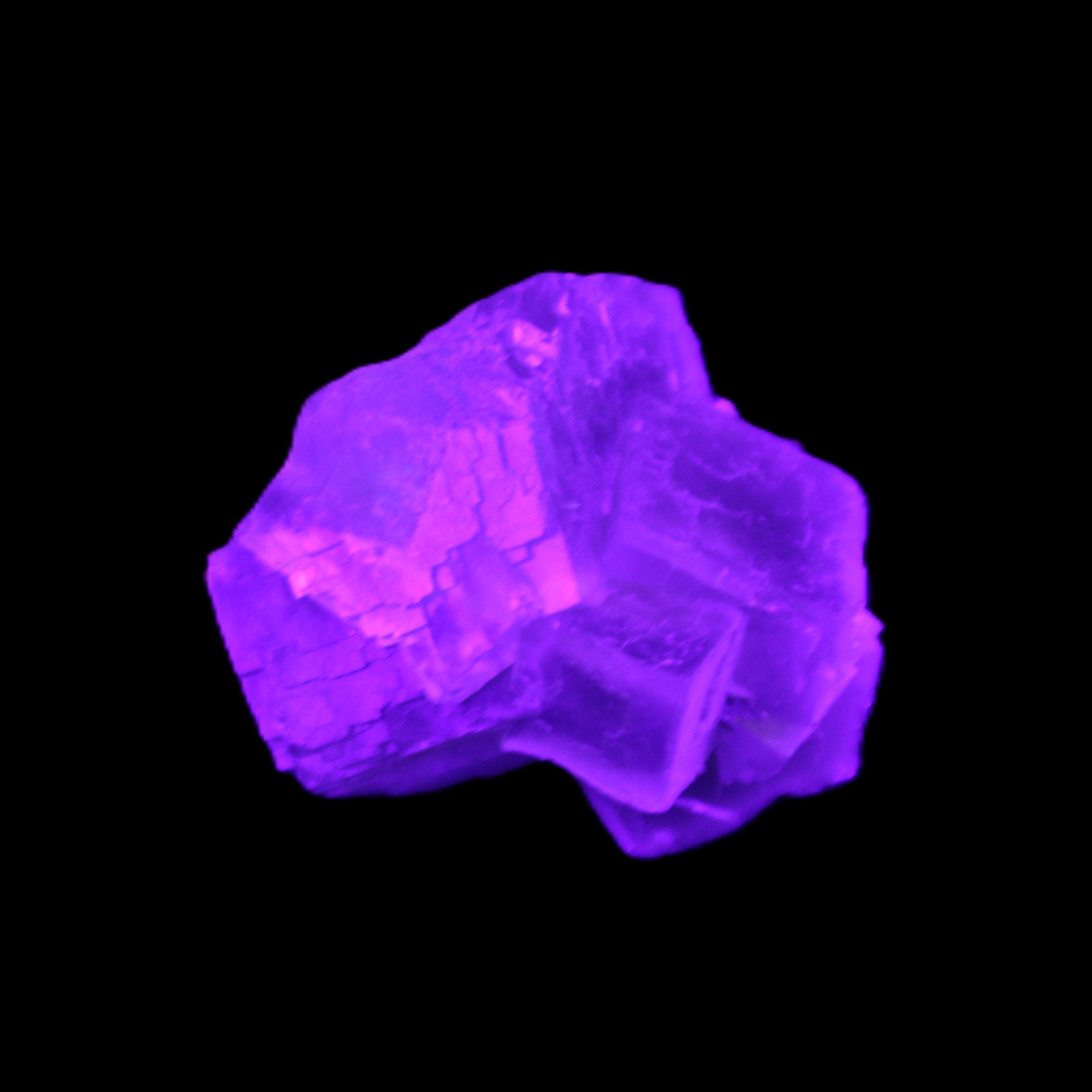 Clear Fluorite cubic cluster 45*40*40mm 102g in UV light - Rocks and Things Store