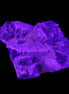 Clear Fluorite cubic cluster 62*60*28mm 104g in UV light - Rocks and Things Store
