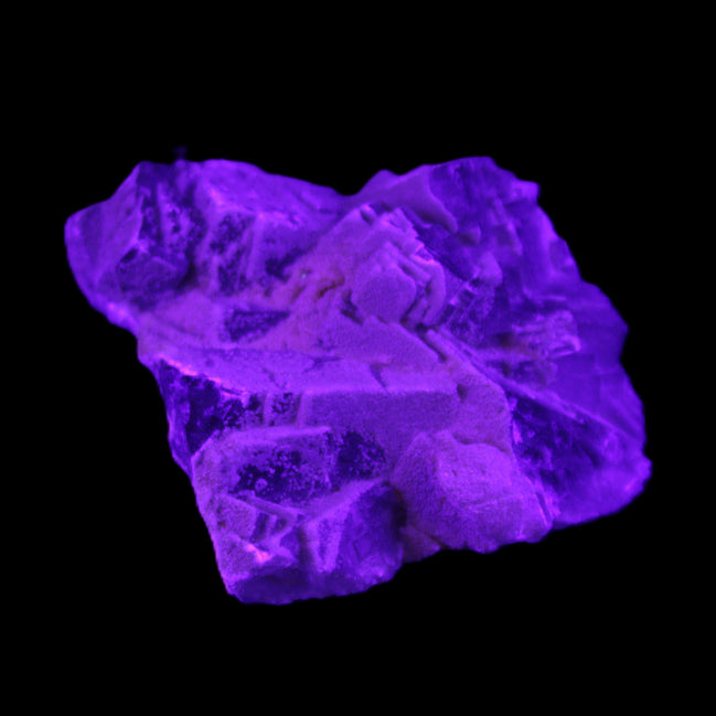 Clear Fluorite cubic cluster 62*60*28mm 104g in UV light - Rocks and Things Store