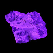 Clear Fluorite cubic cluster 62*60*28mm 104g in UV light - Rocks and Things Store
