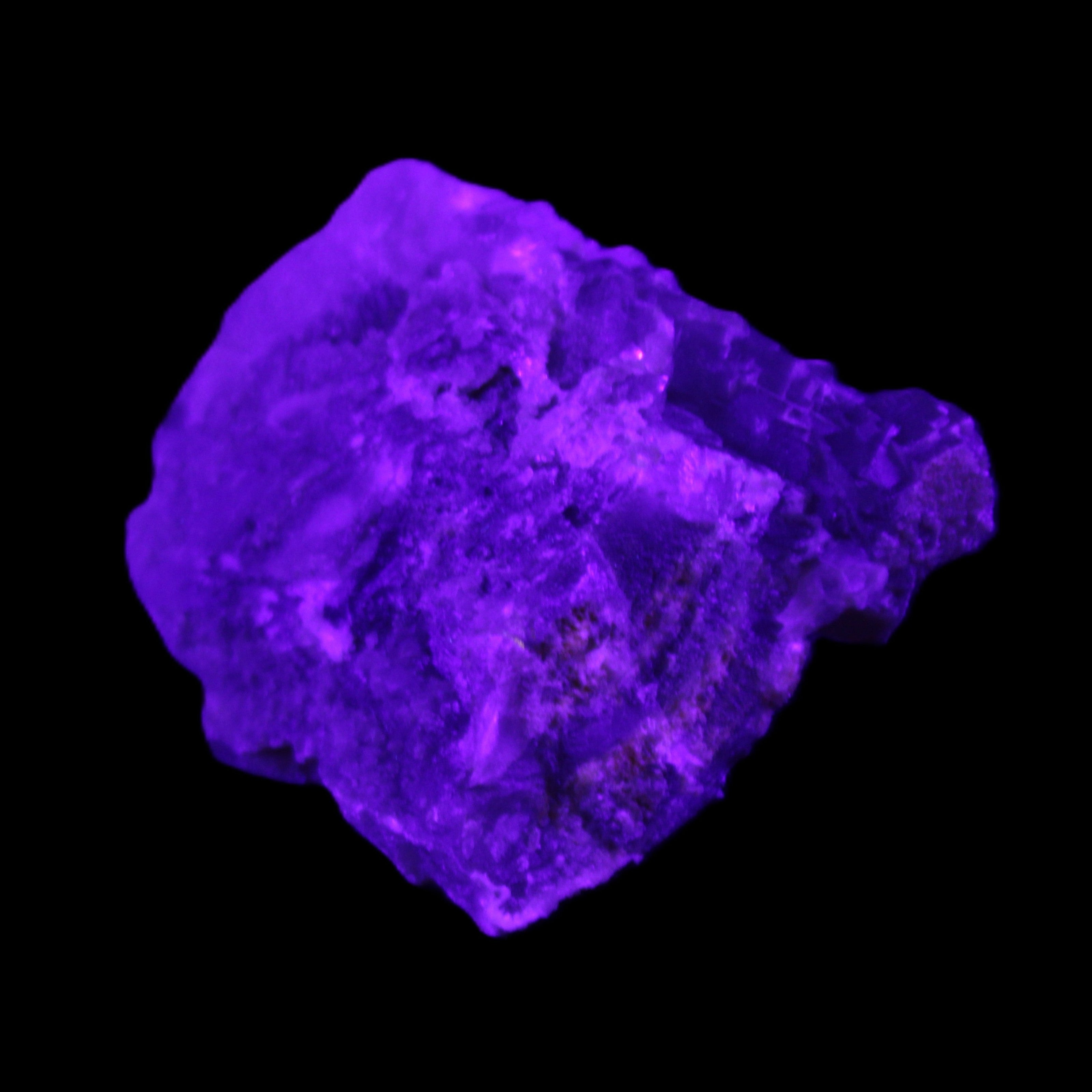 Clear Fluorite cubic cluster 62*60*28mm 104g in UV light - Rocks and Things Store