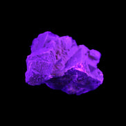 Clear Fluorite cubic cluster 62*60*28mm 104g in UV light - Rocks and Things Store