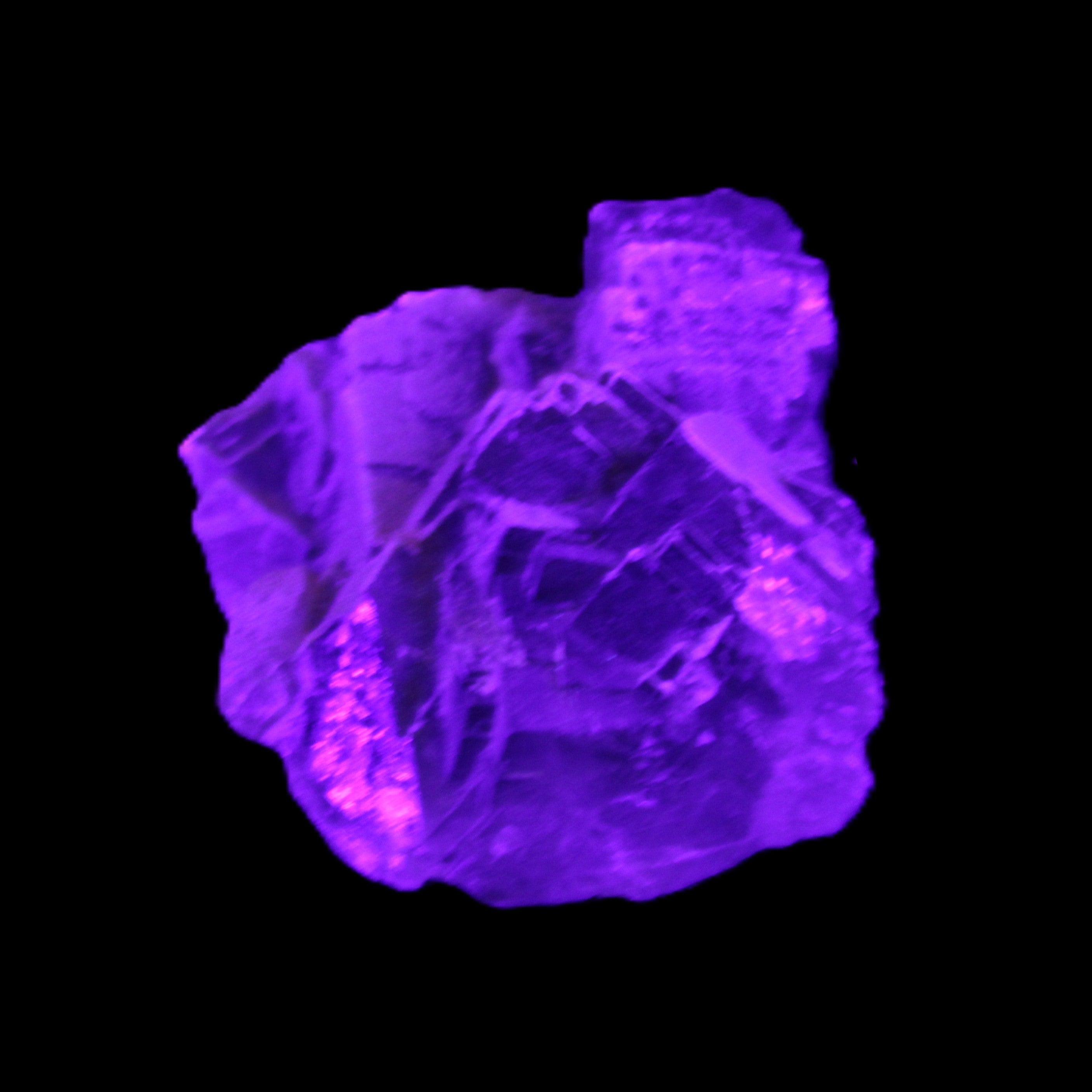 Clear Fluorite cubic cluster 62*60*28mm 104g in UV light - Rocks and Things Store