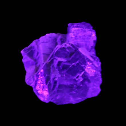 Clear Fluorite cubic cluster 62*60*28mm 104g in UV light - Rocks and Things Store
