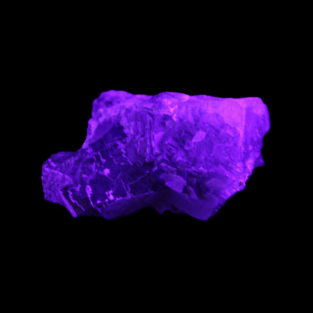 Clear Fluorite cubic cluster 62*60*28mm 104g in UV light - Rocks and Things Store