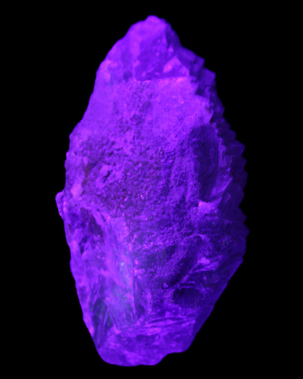 Clear Blue Fluorite cluster 105*55*50mm 487g in UV light - Rocks and Things Store