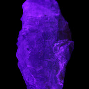 Clear Blue Fluorite cluster 105*55*50mm 487g in UV light - Rocks and Things Store