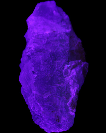 Clear Blue Fluorite cluster 105*55*50mm 487g in UV light - Rocks and Things Store