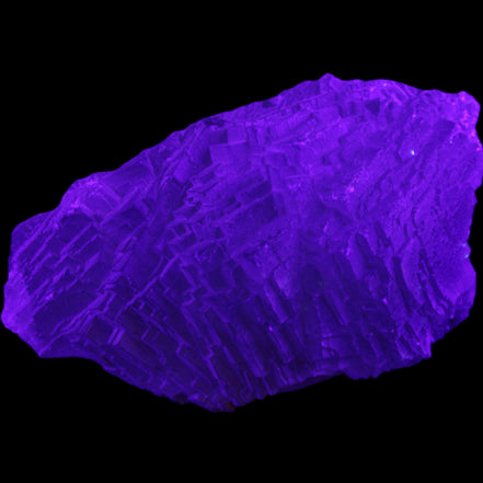 Clear Blue Fluorite cluster 105*55*50mm 487g in UV light - Rocks and Things Store