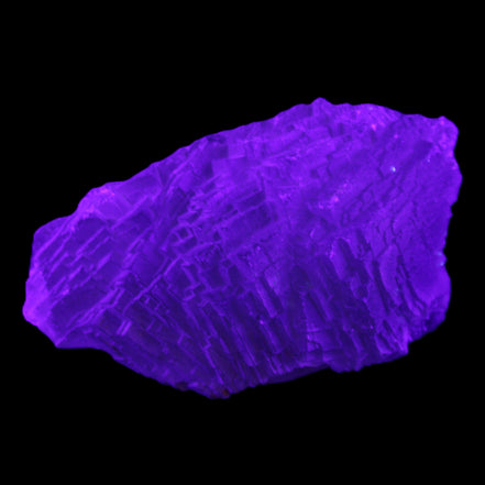 Clear Blue Fluorite cluster 105*55*50mm 487g in UV light - Rocks and Things Store