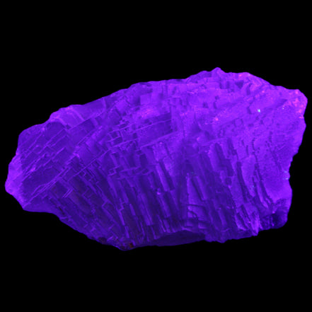Clear Blue Fluorite cluster 105*55*50mm 487g in UV light - Rocks and Things Store