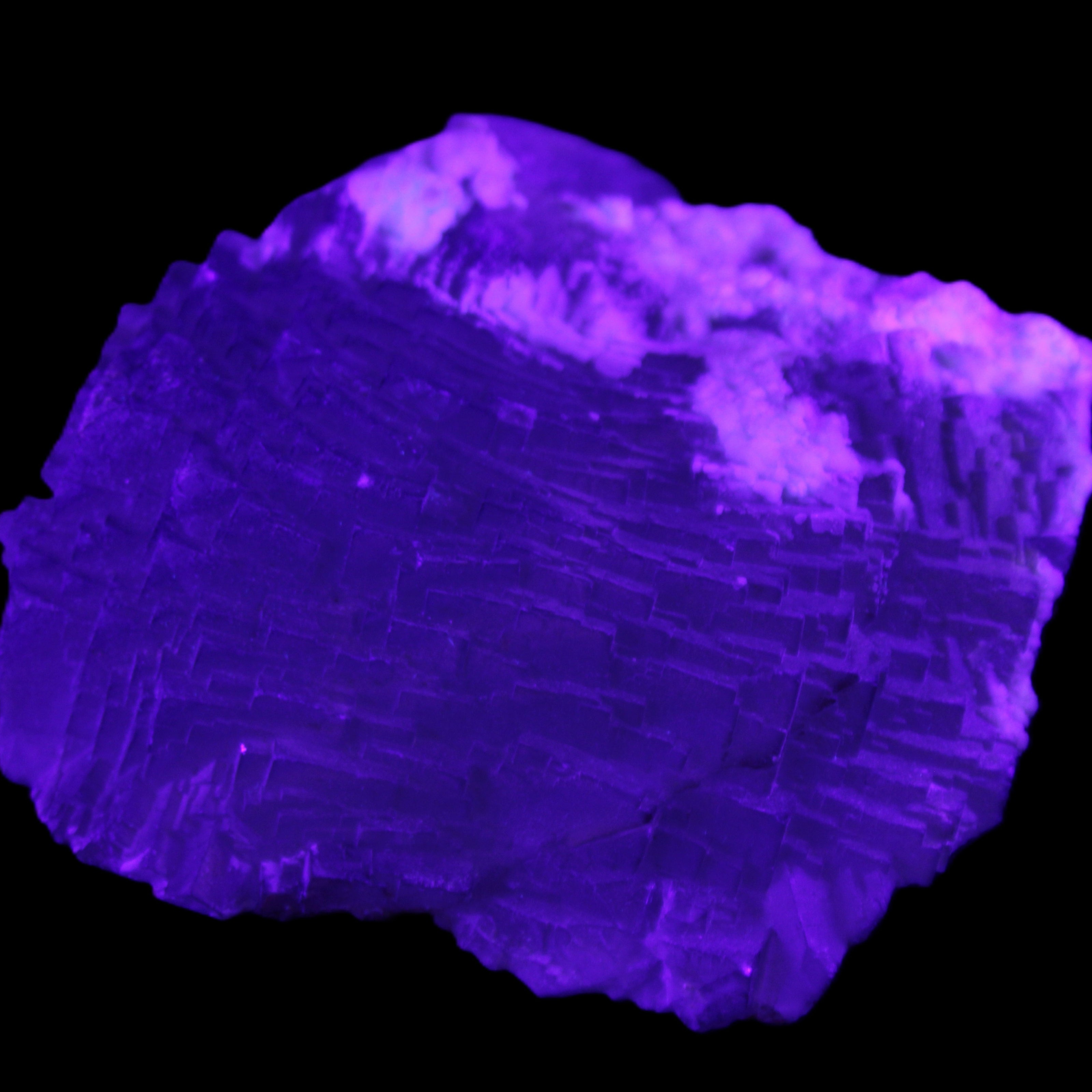 Clear Fluorite stepped cluster 90*80*52mm 523g in UV light - Rocks and Things Store
