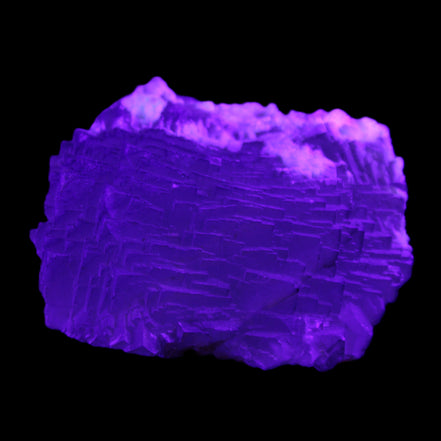 Clear Fluorite stepped cluster 90*80*52mm 523g in UV light - Rocks and Things Store