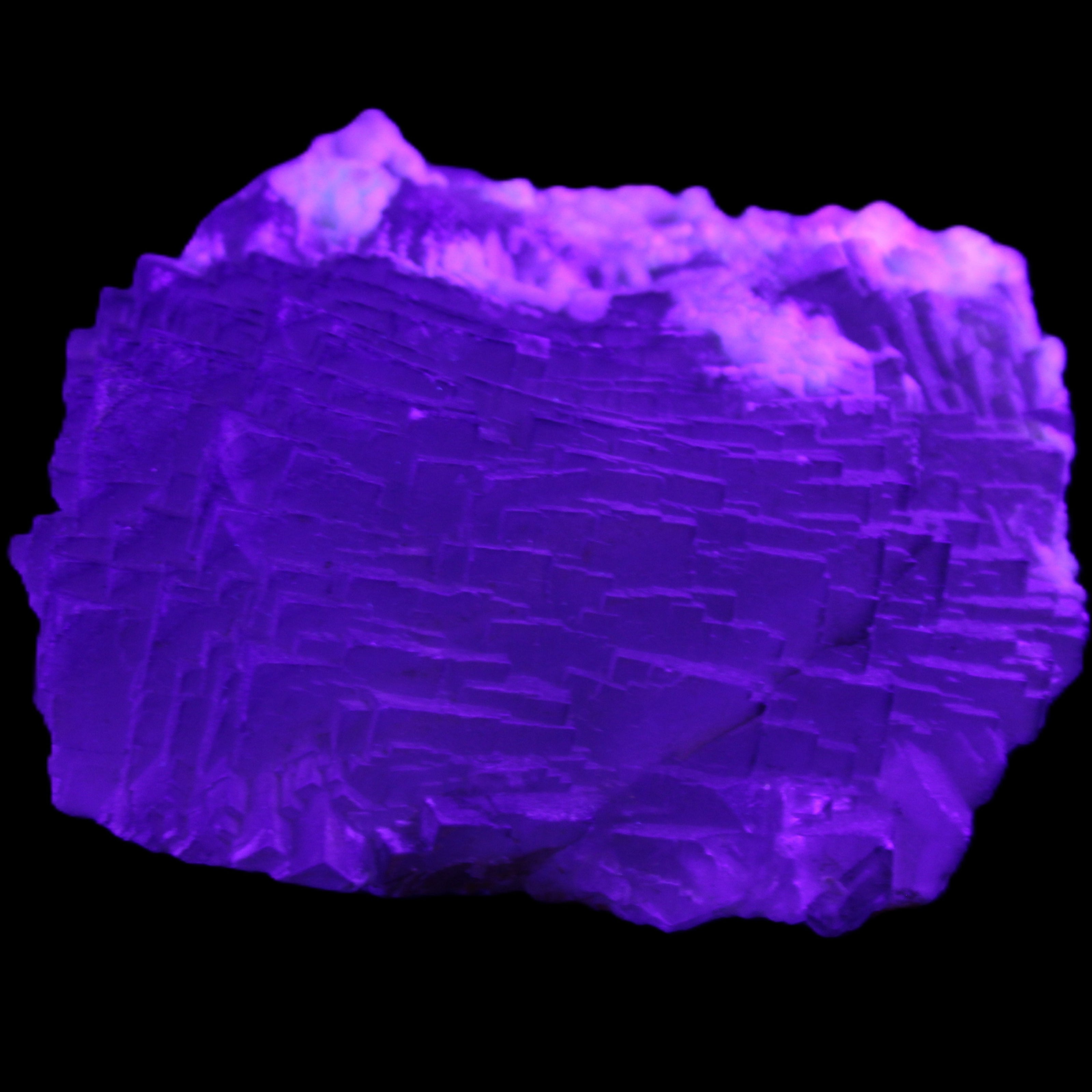 Clear Fluorite stepped cluster 90*80*52mm 523g in UV light - Rocks and Things Store
