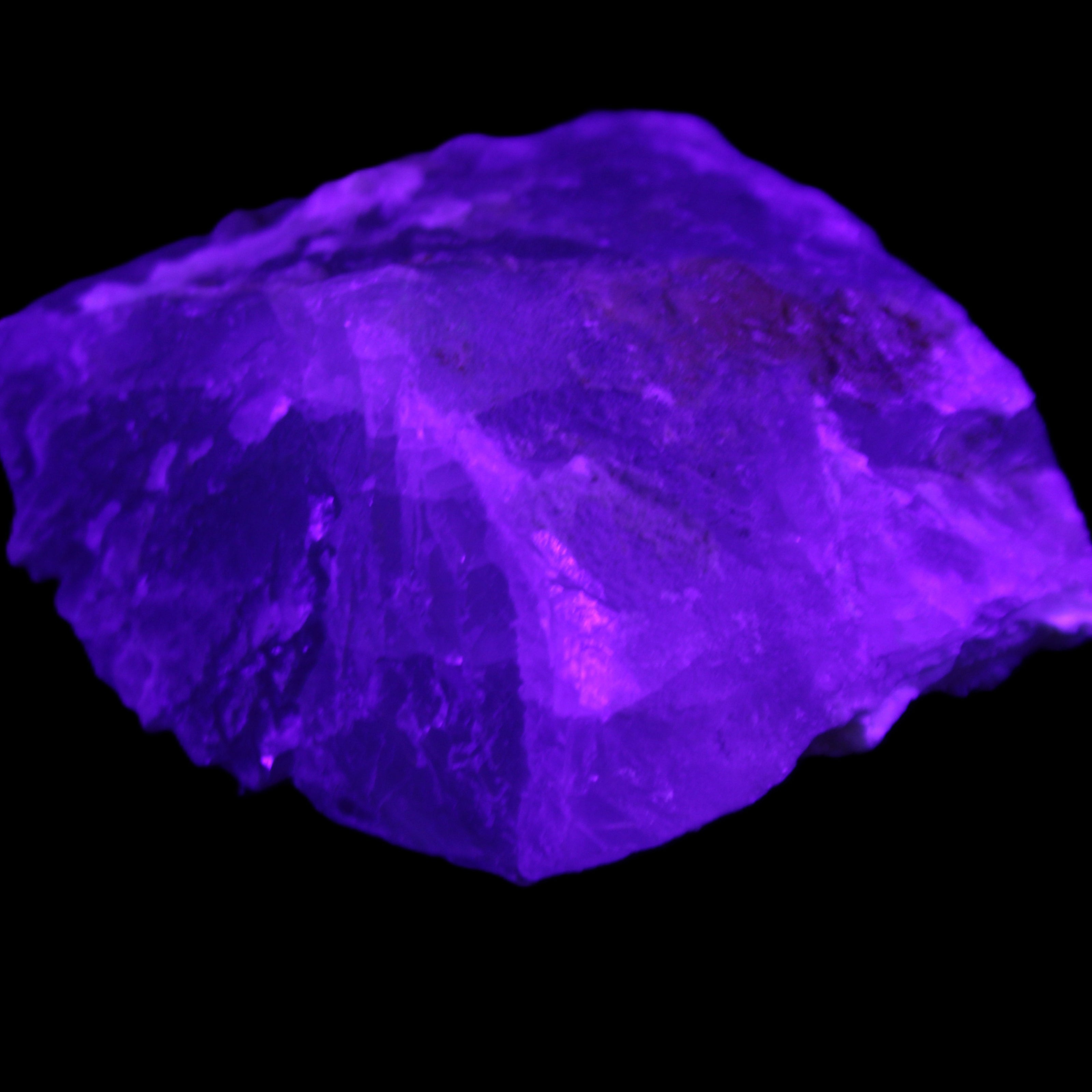 Clear Fluorite stepped cluster 90*80*52mm 523g in UV light - Rocks and Things Store