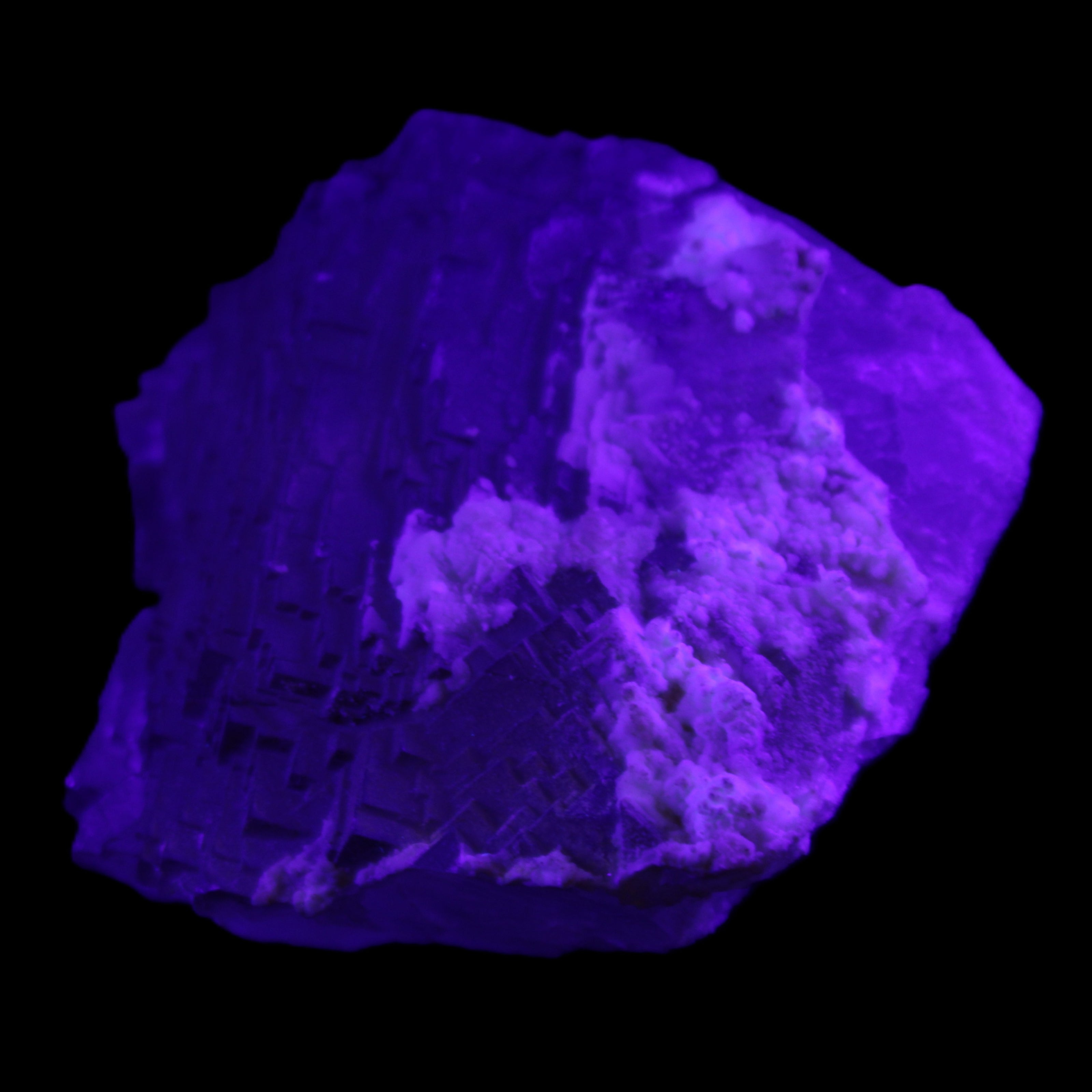 Clear Fluorite stepped cluster 90*80*52mm 523g in UV light - Rocks and Things Store
