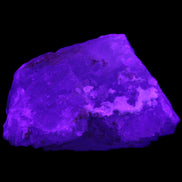 Clear Fluorite stepped cluster 90*80*52mm 523g in UV light - Rocks and Things Store