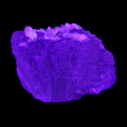 Clear Fluorite stepped cluster 90*80*52mm 523g in UV light - Rocks and Things Store