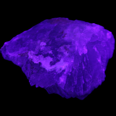 Clear Fluorite stepped cluster 90*80*52mm 523g in UV light - Rocks and Things Store