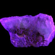 Big Clear Fluorite slab cluster 180*100*70mm 2166g in UV light - Rocks and Things Store