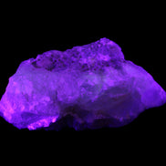 Big Clear Fluorite slab cluster 180*100*70mm 2166g in UV light - Rocks and Things Store