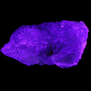 Big Clear Fluorite slab cluster 180*100*70mm 2166g in UV light - Rocks and Things Store