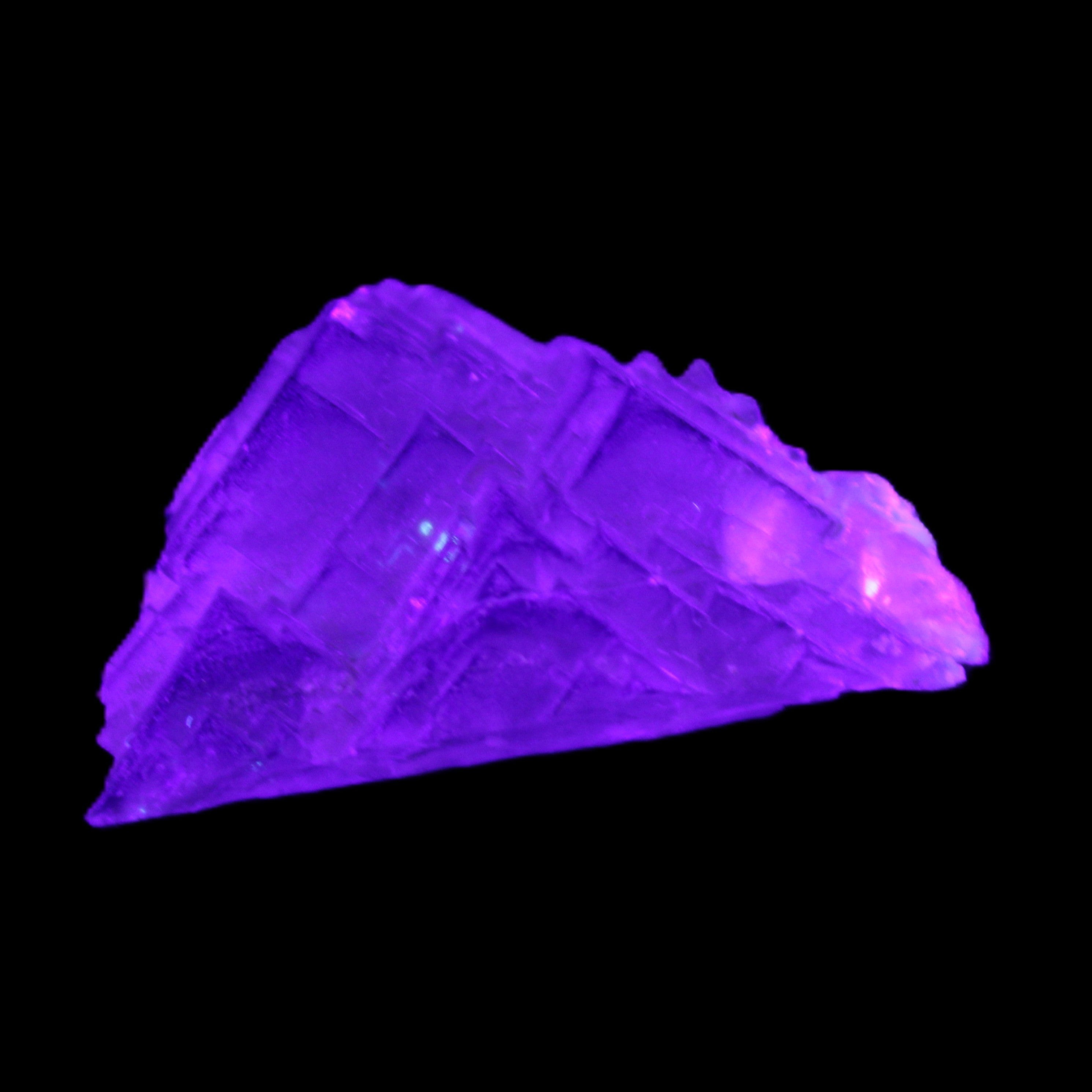 Clear Fluorite 39*28*13mm 16.6g in UV light - Rocks and Things Store