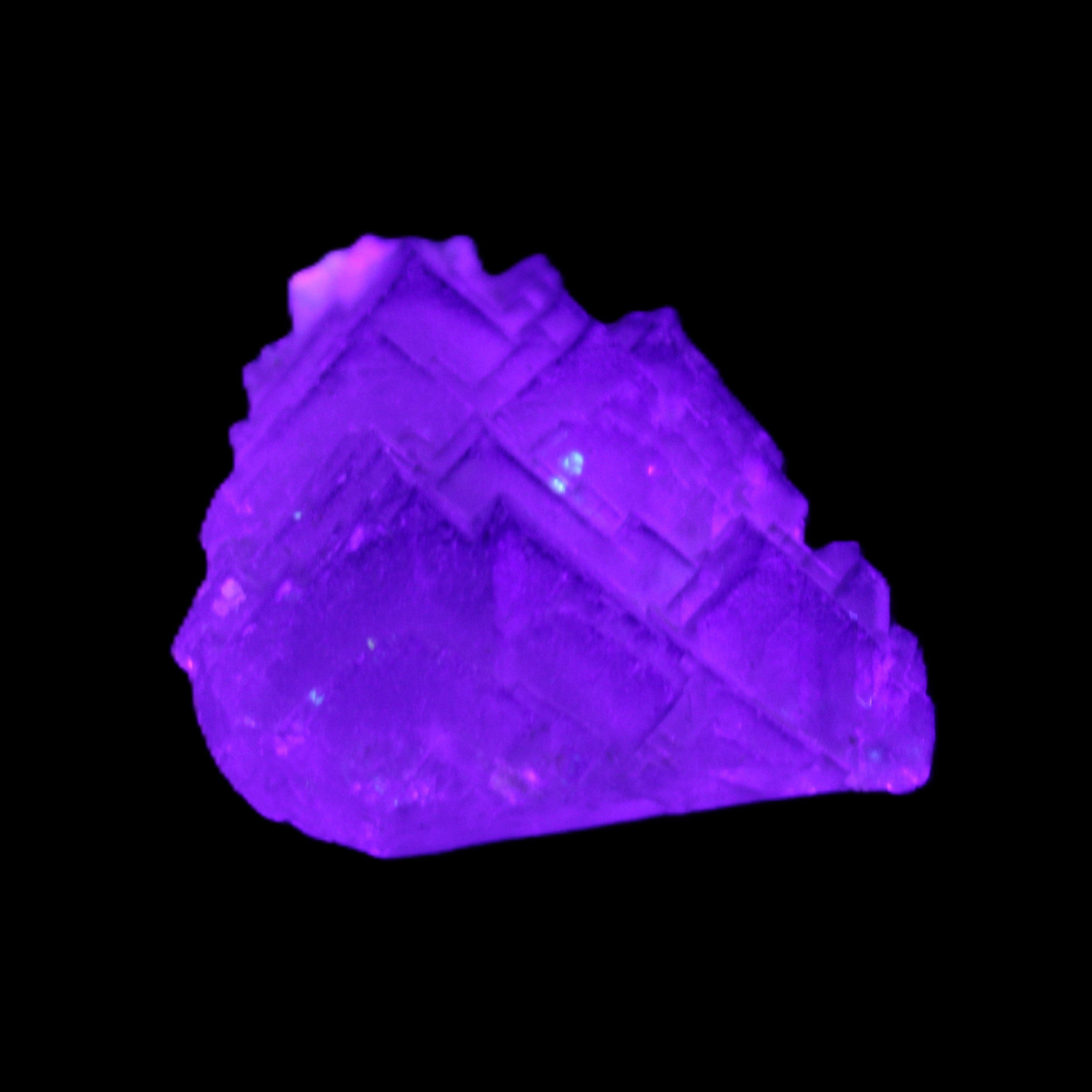 Clear Fluorite 39*28*13mm 16.6g in UV light - Rocks and Things Store