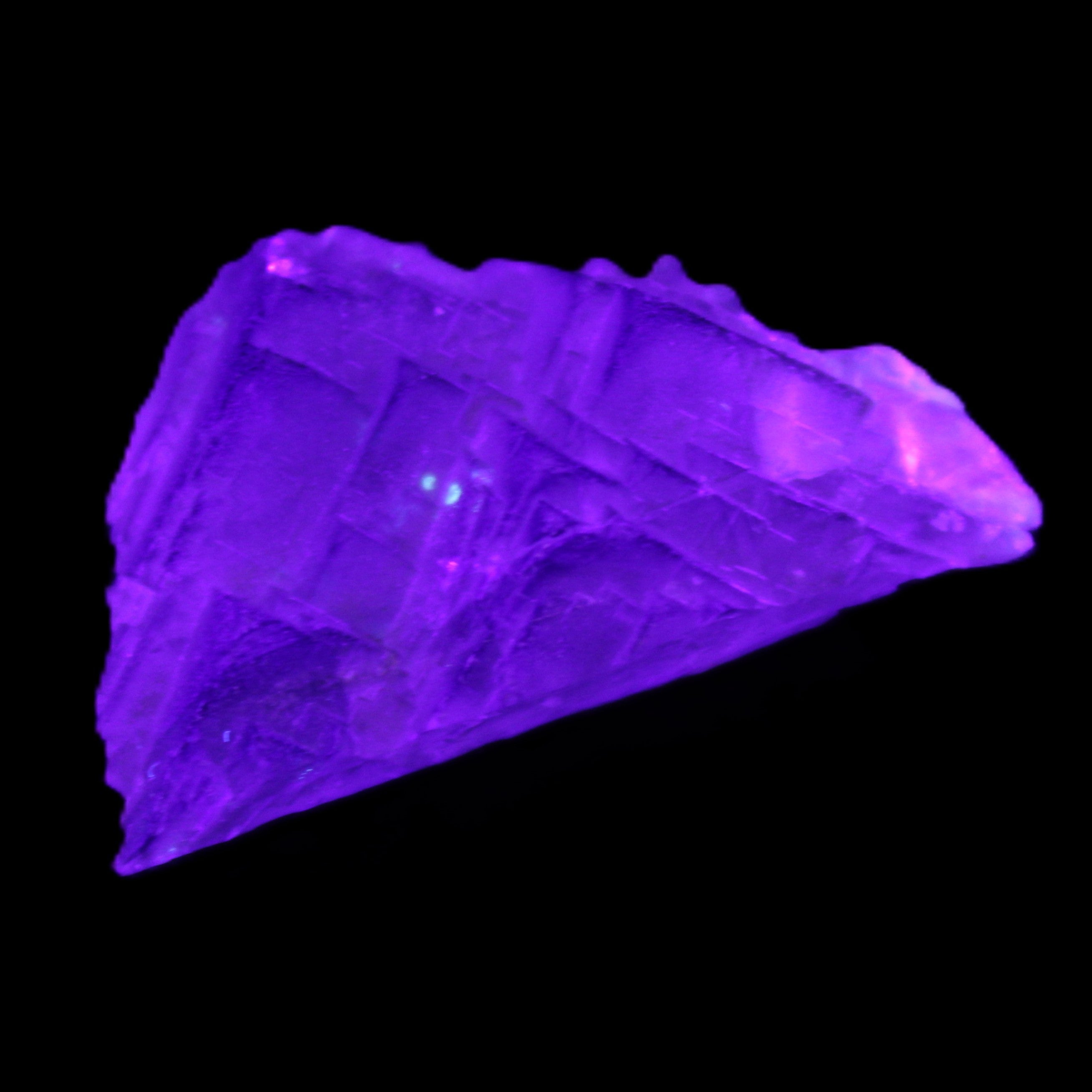 Clear Fluorite 39*28*13mm 16.6g in UV light - Rocks and Things Store