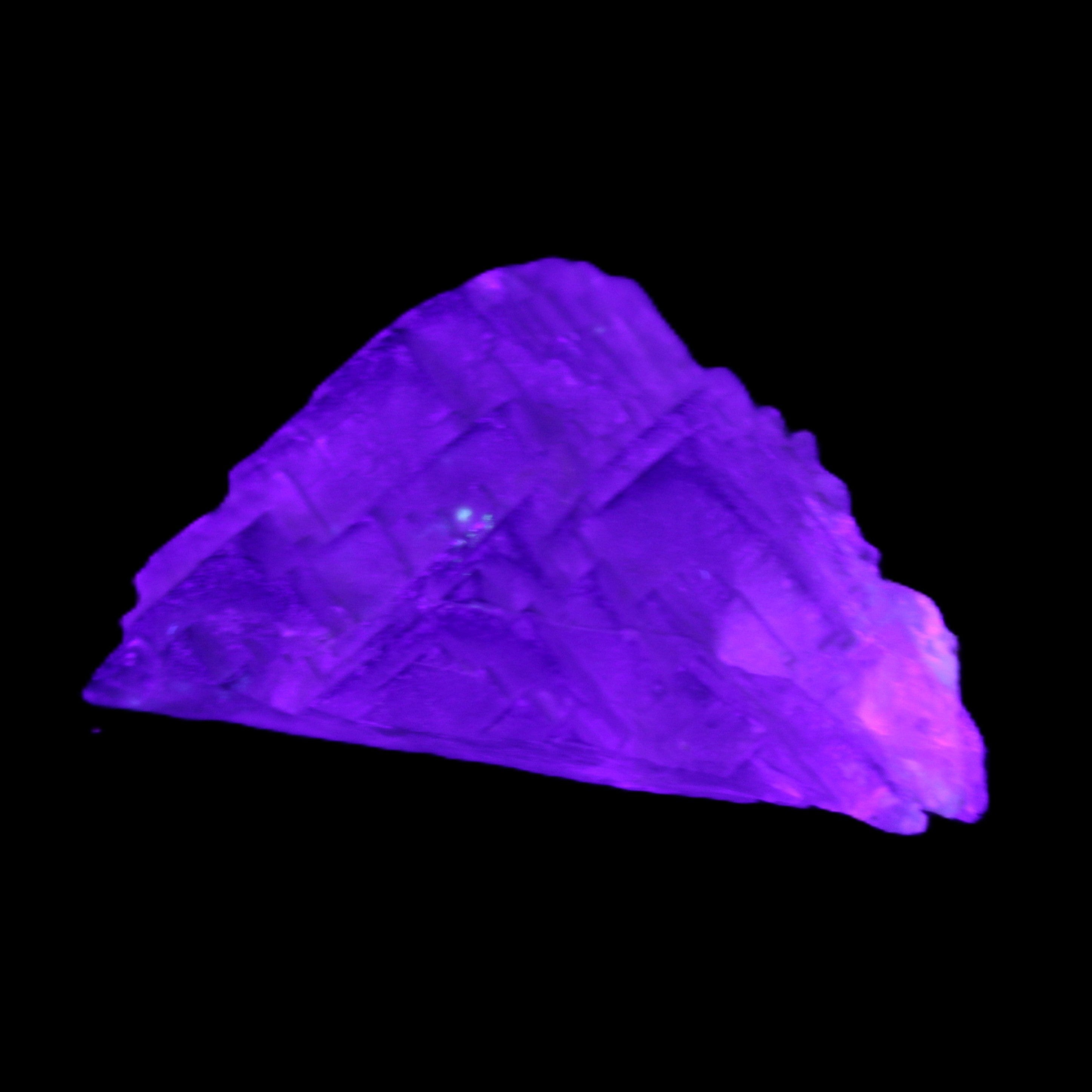 Clear Fluorite 39*28*13mm 16.6g in UV light - Rocks and Things Store
