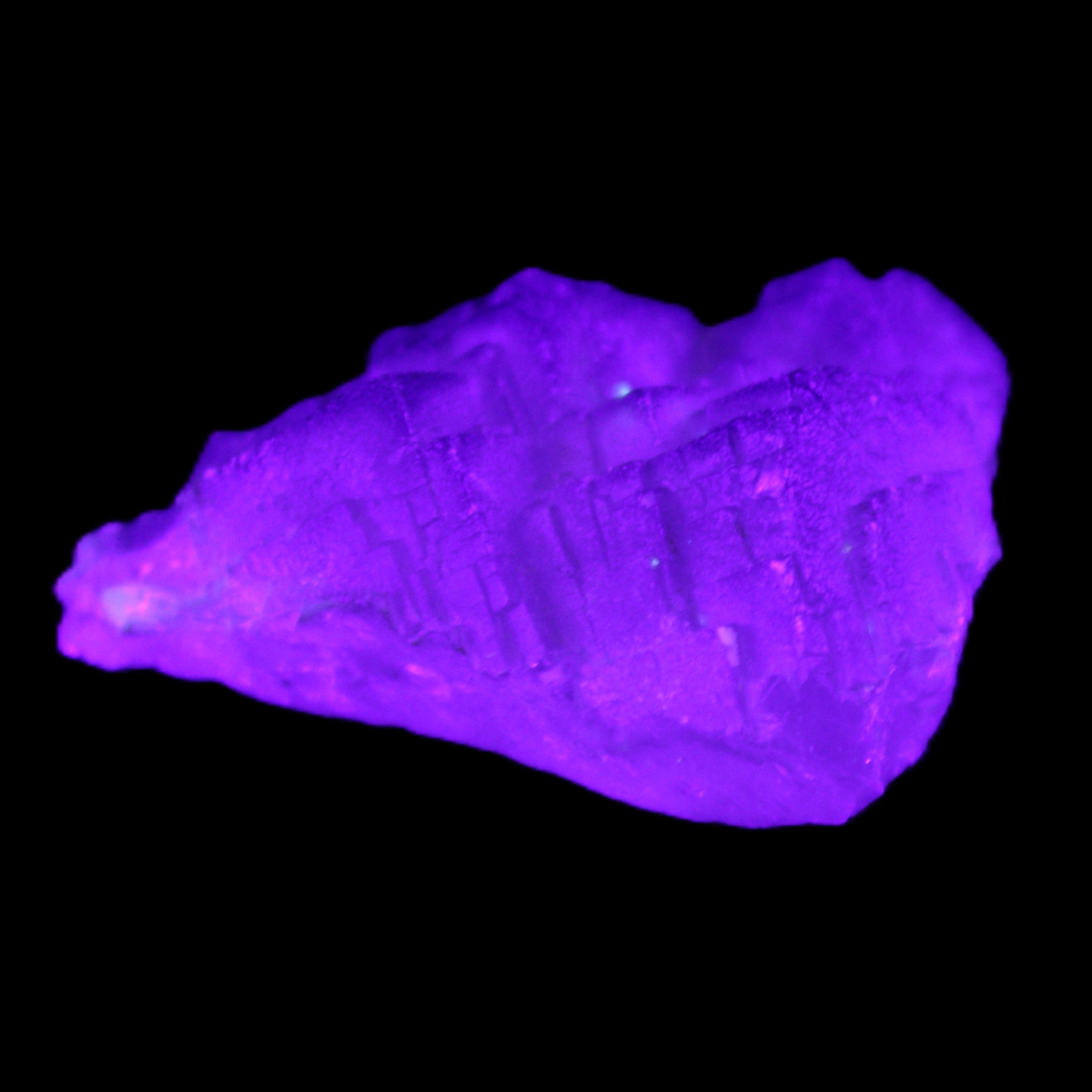 Clear Fluorite 39*28*13mm 16.6g in UV light - Rocks and Things Store