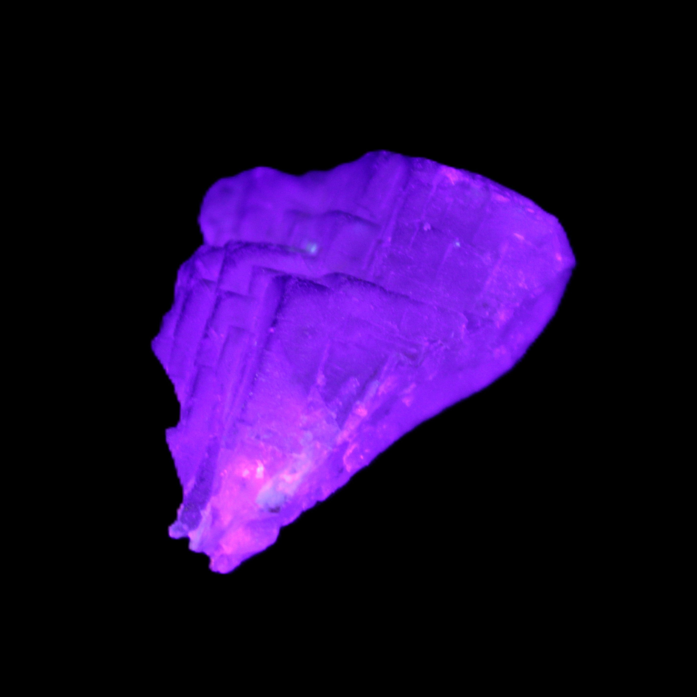 Clear Fluorite 39*28*13mm 16.6g in UV light - Rocks and Things Store