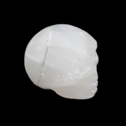Mangano Calcite skull 35*47*40mm 117g in sunlight - Rocks and Things Store