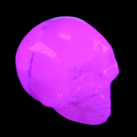 Mangano Calcite skull 35*47*40mm 117g in UV light - Rocks and Things Store
