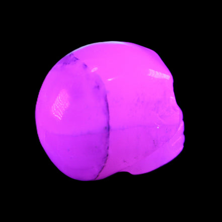 Mangano Calcite skull 35*47*40mm 117g in UV light - Rocks and Things Store