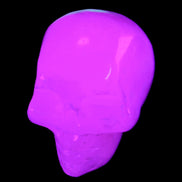 Mangano Calcite skull 35*47*40mm 117g in UV light - Rocks and Things Store