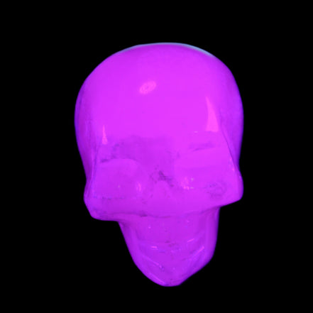 Mangano Calcite skull 35*47*40mm 117g in UV light - Rocks and Things Store