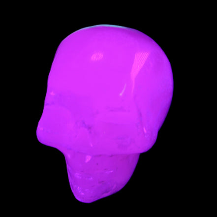 Mangano Calcite skull 35*47*40mm 117g in UV light - Rocks and Things Store