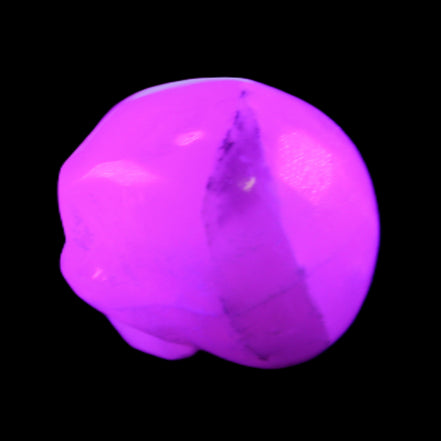 Mangano Calcite skull 35*47*40mm 117g in UV light - Rocks and Things Store