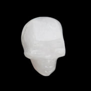Mangano Calcite skull 35*47*40mm 117g in sunlight - Rocks and Things Store