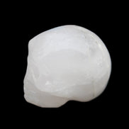 Mangano Calcite skull 35*47*40mm 117g in sunlight - Rocks and Things Store