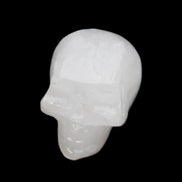 Mangano Calcite skull 35*47*40mm 117g in sunlight - Rocks and Things Store