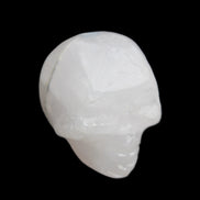 Mangano Calcite skull 35*47*40mm 117g in sunlight - Rocks and Things Store